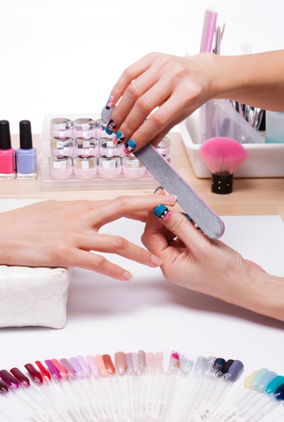 Close-up of manicure being done in a nail salon